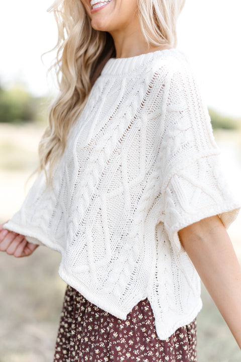 SWEATERS